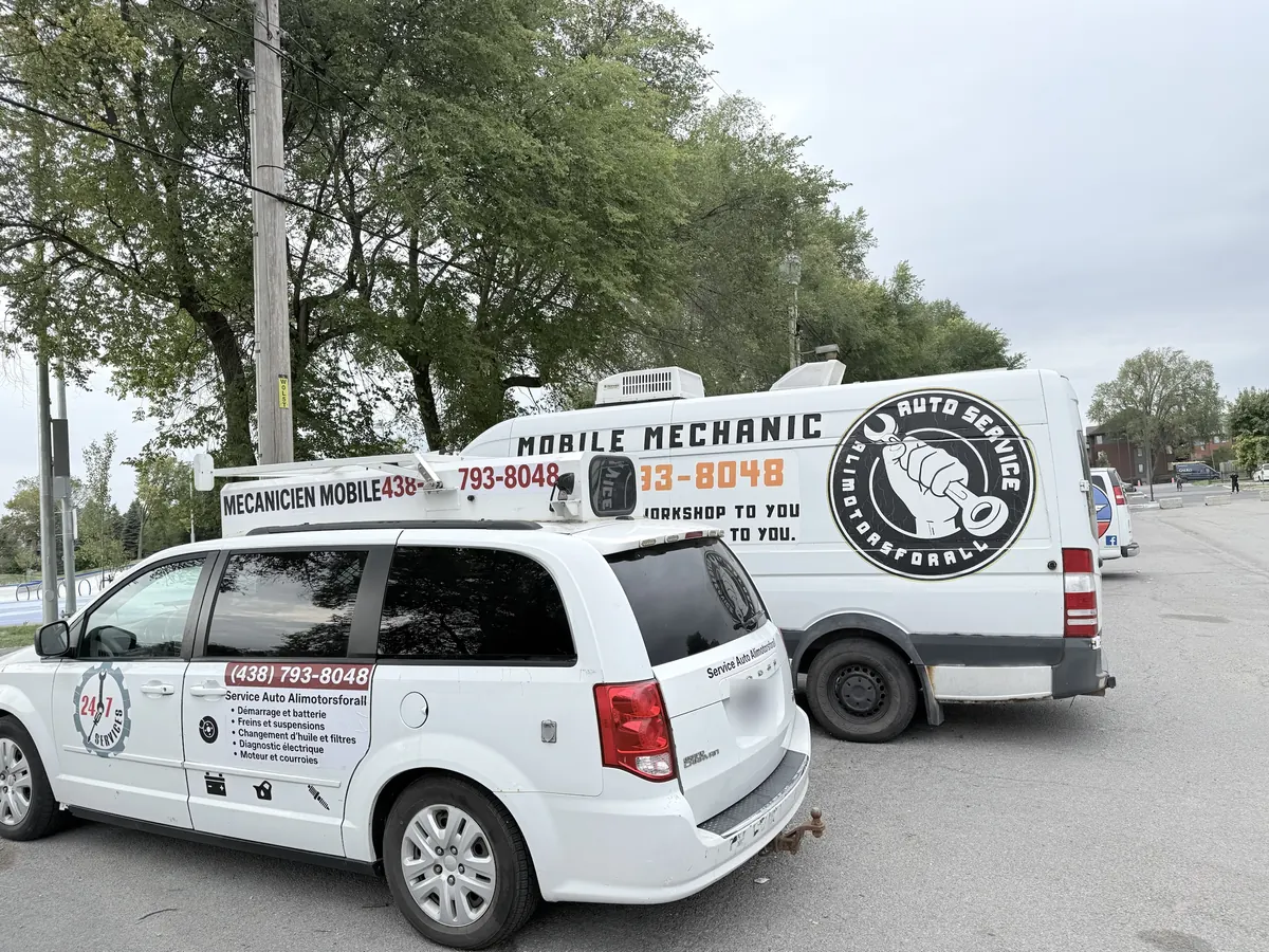 Alimotorsforall lettered Dodge Grand Caravan and Sprinter mobile mechanic van parked together