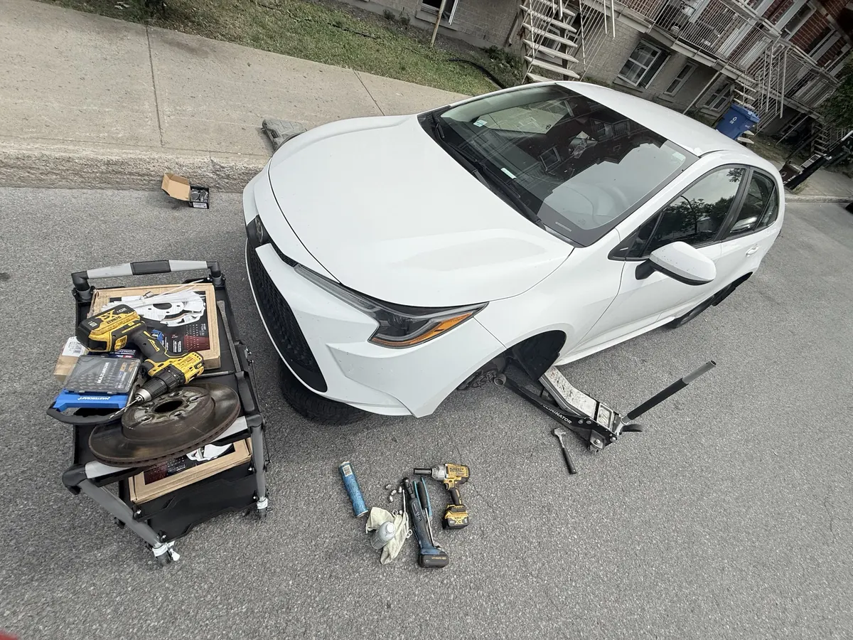 Toyota Corolla: Rotors and pads, done at the curb
